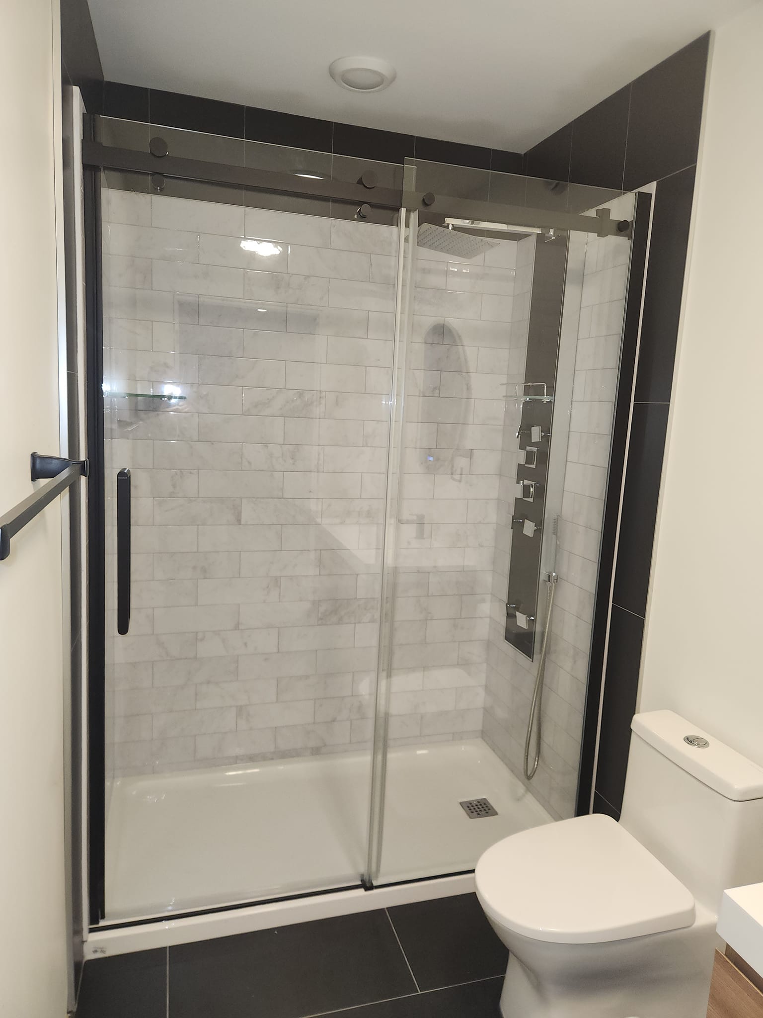 Custom rainfall shower tower