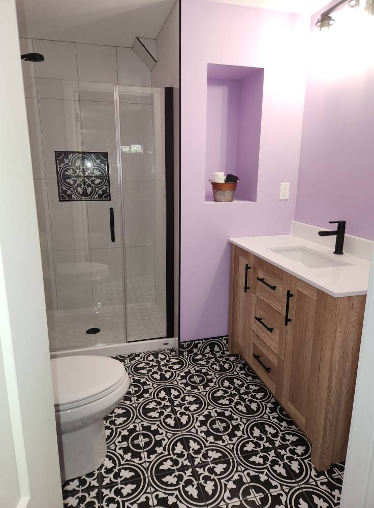 Custom patterned tile bathroom renovation